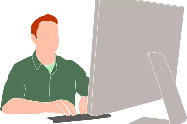 Person sitter vid dataskärm och skriver på tangentborg. Bild från Pixabay..