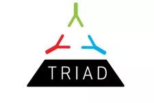 Logga för Triad. Bild.