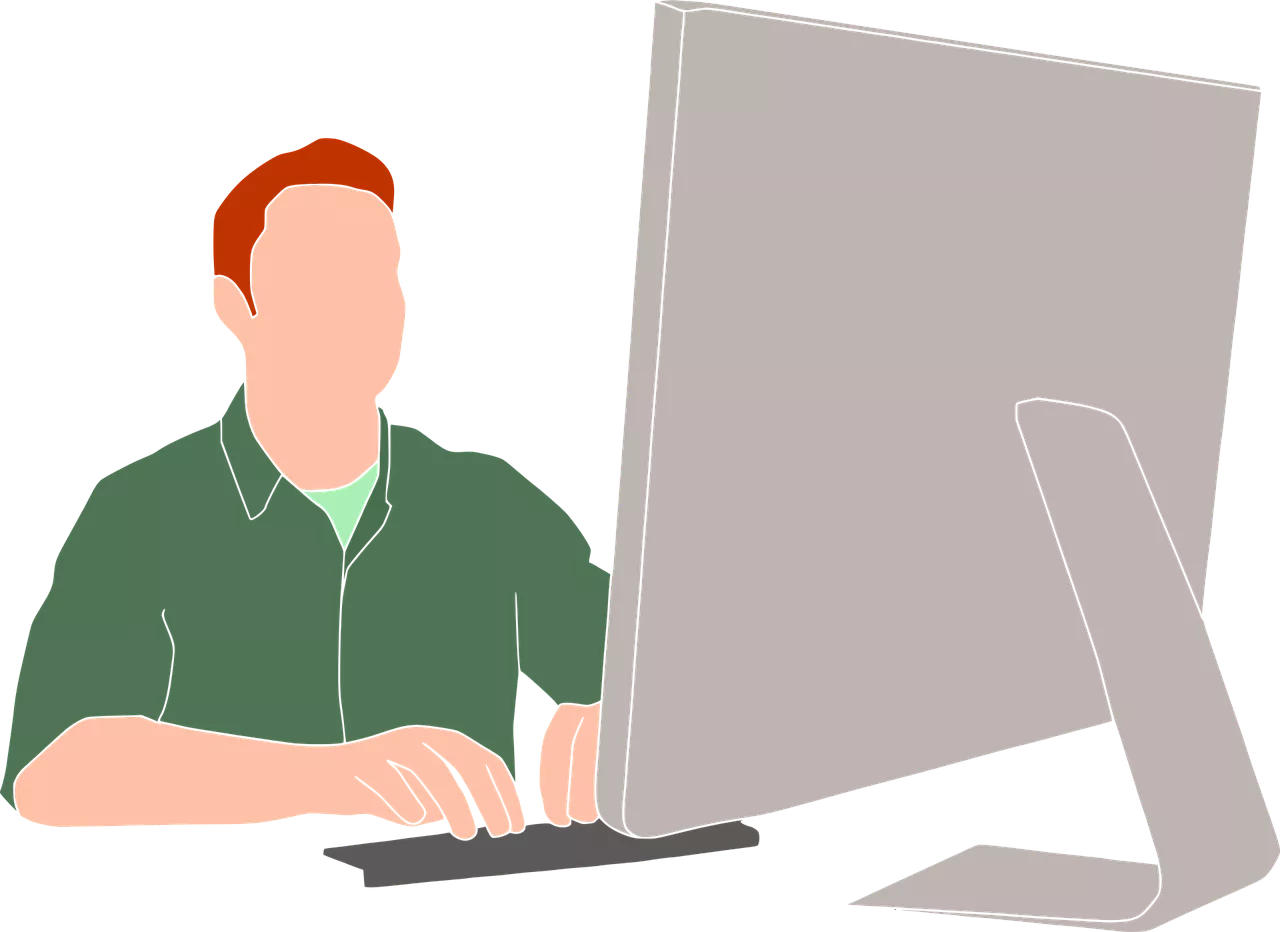 Person sitter vid dataskärm och skriver på tangentborg. Bild från Pixabay..